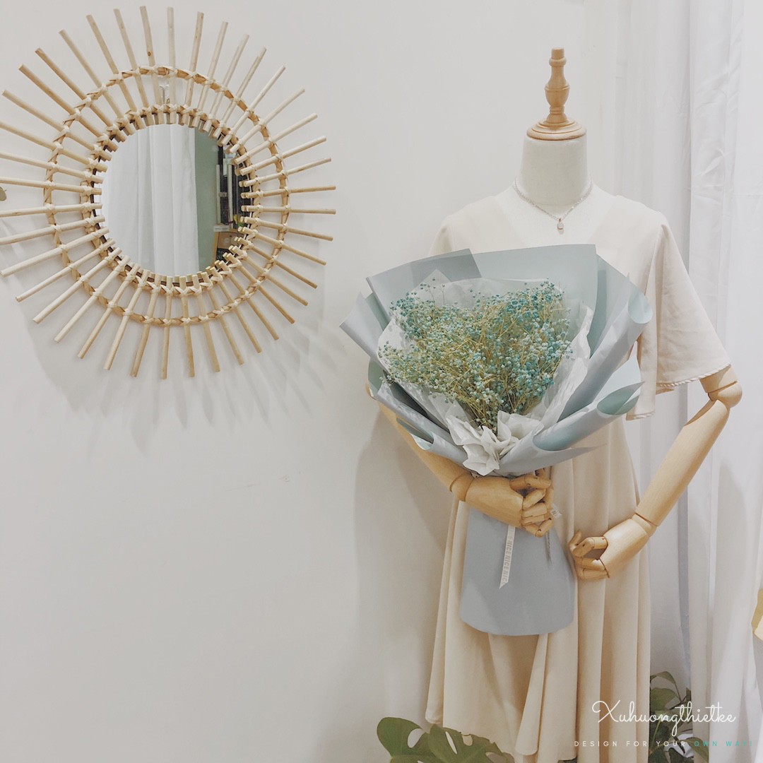 Vẻ đẹp nhẹ nhàng của gương mây treo tường trong trang trí shop thời trang