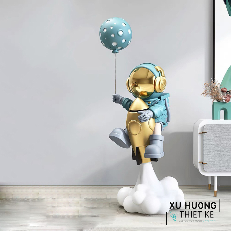 Tượng phi hành gia thả bóng bay