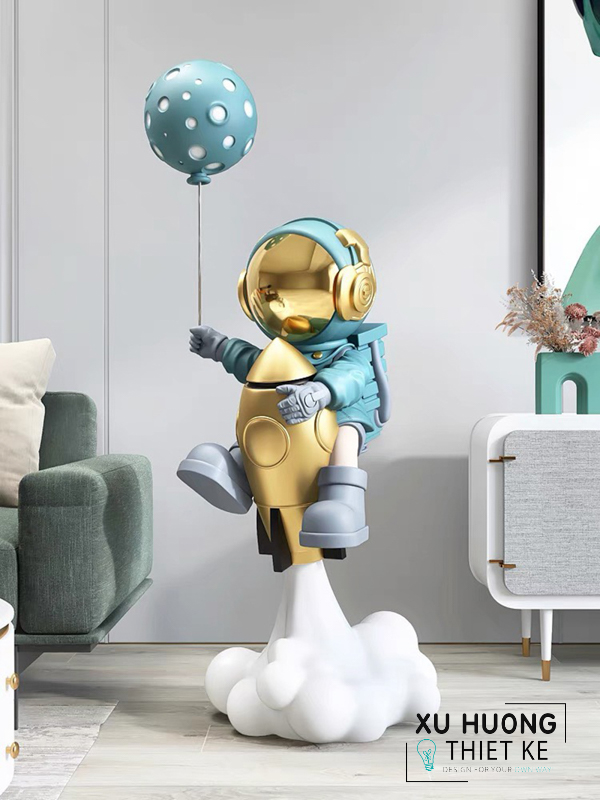 Tượng phi hành gia thả bóng bay