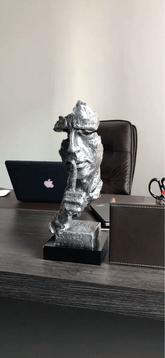 Tượng trang trí im lặng là vàng